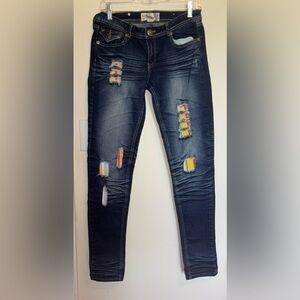 Raw Blue Distressed Blue Jeans with Colorful Accents